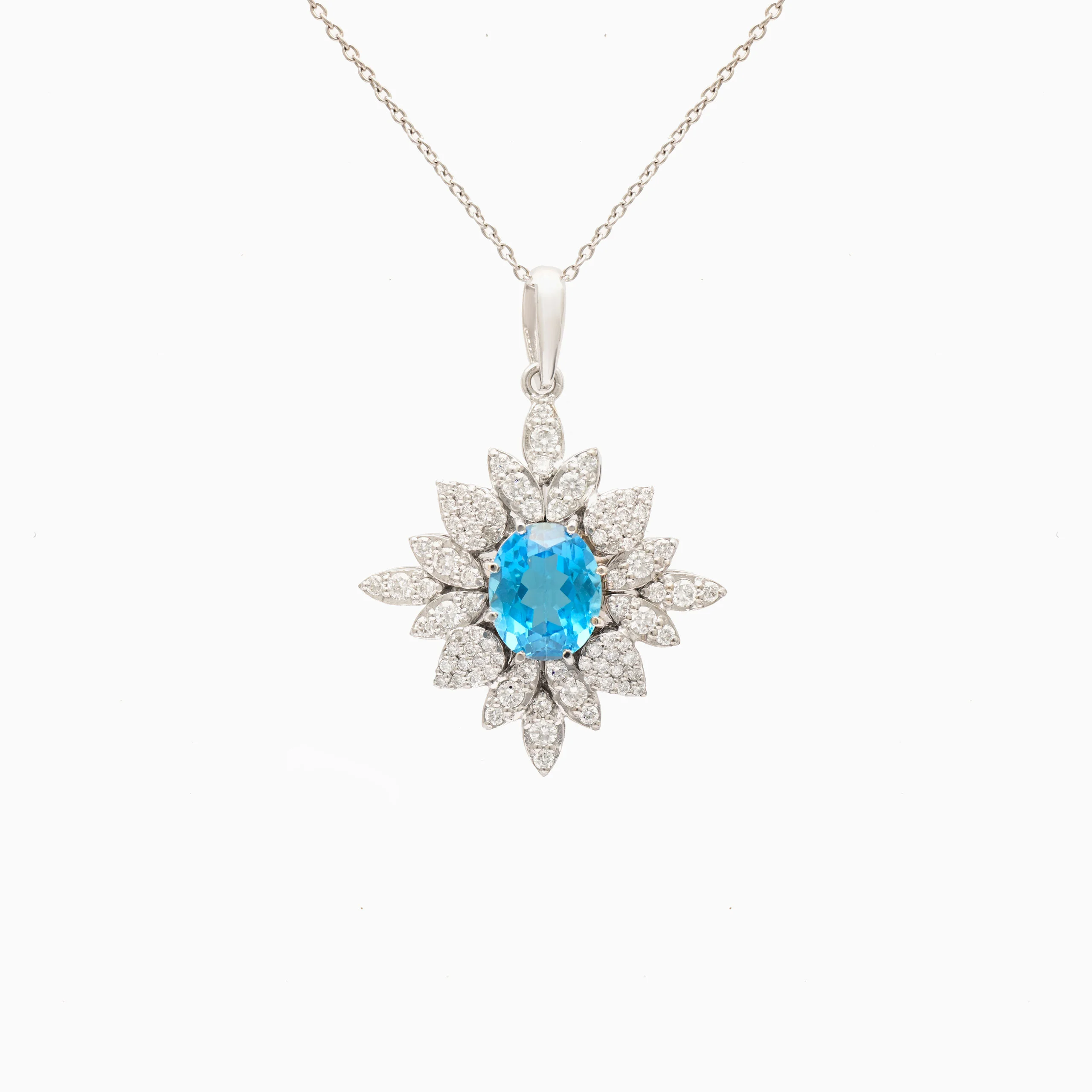 18kt White Gold Pendant with Blue Topaz and Diamonds