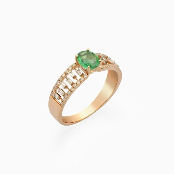 18kt Yellow Gold White Diamond studded Ring with a petite Emerald to top it off